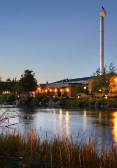 Renovated,Old,Industrial,Riverside,Buildings,At,Sunset,In,Bend,,Oregon